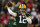 GREEN BAY, WISCONSIN - JANUARY 22:  Quarterback Aaron Rodgers #12 of the Green Bay Packers warms up prior to the NFC Divisional Playoff game against the San Francisco 49ers at Lambeau Field on January 22, 2022 in Green Bay, Wisconsin. (Photo by Quinn Harris/Getty Images)