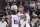 SACRAMENTO, CA - MARCH 16: Domantas Sabonis #10 of the Sacramento Kings talks to teammates Davion Mitchell #15 and De'Aaron Fox #5 during the game against the Milwaukee Bucks on March 16, 2022 at Golden 1 Center in Sacramento, California. NOTE TO USER: User expressly acknowledges and agrees that, by downloading and or using this photograph, User is consenting to the terms and conditions of the Getty Images Agreement. Mandatory Copyright Notice: Copyright 2022 NBAE (Photo by Rocky Widner/NBAE via Getty Images)