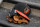 DETROIT, MICHIGAN - MAY 14: A Baltimore Orioles hat is pictured with Franklin batting gloves during the game against the Detroit Tigers at Comerica Park on May 14, 2022 in Detroit, Michigan. (Photo by Nic Antaya/Getty Images)