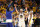 SAN FRANCISCO, CALIFORNIA - JUNE 13: Klay Thompson #11 of the Golden State Warriors celebrates his three point basket with teammates Damion Lee #1 and Andrew Wiggins #22 of the Golden State Warriors during the fourth quarter against the Boston Celtics in Game Five of the 2022 NBA Finals at Chase Center on June 13, 2022 in San Francisco, California. NOTE TO USER: User expressly acknowledges and agrees that, by downloading and/or using this photograph, User is consenting to the terms and conditions of the Getty Images License Agreement. (Photo by Ezra Shaw/Getty Images)