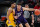 INDIANAPOLIS, IN - MARCH 10: Northwestern Wildcats forward Pete Nance (22) backs into the post against Iowa Hawkeyes forward Keegan Murray (15) during the mens Big Ten tournament college basketball game between the Northwestern Wildcats and Iowa Hawkeyes on March 10, 2022, at Gainbridge Fieldhouse in Indianapolis, IN. (Photo by Zach Bolinger/Icon Sportswire via Getty Images)