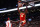 TORONTO, ON - APRIL 05: Clint Capela #15 of the Atlanta Hawks dunks on Pascal Siakam #43 of the Toronto Raptors during the first half of their NBA game at Scotiabank Arena on April 5, 2022 in Toronto, Canada. NOTE TO USER: User expressly acknowledges and agrees that, by downloading and or using this Photograph, user is consenting to the terms and conditions of the Getty Images License Agreement. (Photo by Cole Burston/Getty Images)