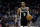 NEW ORLEANS, LOUISIANA - MARCH 26: Dejounte Murray #5 of the San Antonio Spurs dribbles the ball down court during the third quarter of an NBA game against the New Orleans Pelicans at Smoothie King Center on March 26, 2022 in New Orleans, Louisiana. San Antonio Spurs won the game 107 - 103. NOTE TO USER: User expressly acknowledges and agrees that, by downloading and or using this photograph, User is consenting to the terms and conditions of the Getty Images License Agreement. (Photo by Sean Gardner/Getty Images)