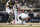 SAN DIEGO, CA - JUNE 25:  Bryce Harper #3 of the Philadelphia Phillies falls after being hit with a pitch as Jorge Alfaro #38 of the San Diego Padres looks on during the fourth inning of a baseball game June 25, 2022 at Petco Park in San Diego, California. (Photo by Denis Poroy/Getty Images)