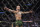 Sean O'Malley celebrates during his bantamweight mixed martial arts bout against Kris Moutinho at UFC 264 on Saturday, July 10, 2021, in Las Vegas. (AP Photo/John Locher)