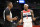 WASHINGTON, DC - JANUARY 25: Bradley Beal #3 of the Washington Wizards talks with official Sean Wright #4 during the game against the LA Clippers at Capital One Arena on January 25, 2022 in Washington, DC. NOTE TO USER: User expressly acknowledges and agrees that, by downloading and or using this photograph, User is consenting to the terms and conditions of the Getty Images License Agreement.  (Photo by G Fiume/Getty Images)