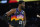 Phoenix Suns center Deandre Ayton (22) looks away after being fouled during the first half of Game 7 of an NBA basketball Western Conference playoff semifinal against theDallas Mavericks, Sunday, May 15, 2022, in Phoenix. (AP Photo/Matt York)