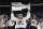 TAMPA, FLORIDA - JUNE 26: Nathan MacKinnon #29 of the Colorado Avalanche carries the Stanley Cup following the series winning victory over the Tampa Bay Lightning in Game Six of the 2022 NHL Stanley Cup Final at Amalie Arena on June 26, 2022 in Tampa, Florida. (Photo by Bruce Bennett/Getty Images)