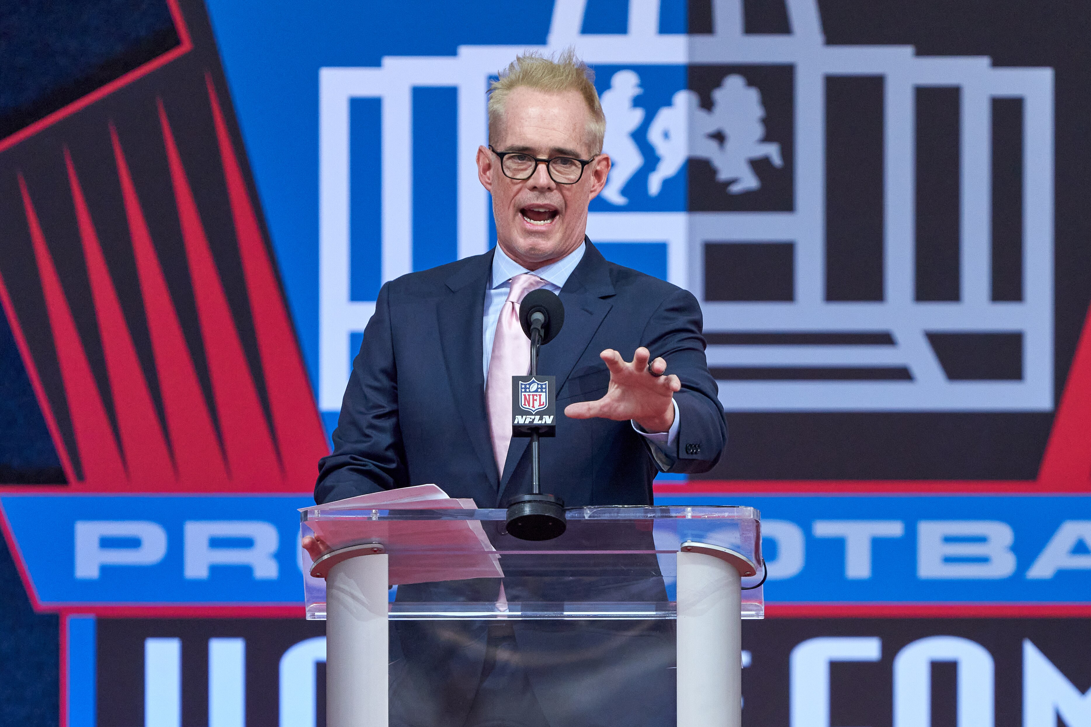 CANTON, OH - AUGUST 07: Fox Sports NFL Analyst Joe Buck speaks after receiving the Pete Rozelle Radio - Television award during the Pro Football HOF Centennial Class of 2020 enshrinement ceremonies on August 7, 2021 at Tom Benson Hall of Fame Stadium, in Canton, OH. (Photo by MSA/Icon Sportswire via Getty Images)