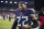 NASHVILLE, TENNESSEE - JANUARY 22: Derrick Henry #22 of the Tennessee Titans walks off the field after a game against the Cincinnati Bengals in the AFC Divisional Playoff game at Nissan Stadium on January 22, 2022 in Nashville, Tennessee. The Bengals defeated the Titans 19-16. (Photo by Wesley Hitt/Getty Images)