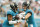 JACKSONVILLE, FLORIDA - DECEMBER 19: Trevor Lawrence #16 of the Jacksonville Jaguars hands the ball off to James Robinson #25 against the Houston Texans during the first quarter at TIAA Bank Field on December 19, 2021 in Jacksonville, Florida. (Photo by Michael Reaves/Getty Images)