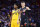 MIAMI, FLORIDA - NOVEMBER 06: Donovan Mitchell #45 of the Utah Jazz and Tyler Herro #14 of the Miami Heat look on during the fourth quarter at FTX Arena on November 06, 2021 in Miami, Florida. NOTE TO USER: User expressly acknowledges and agrees that, by downloading and or using this photograph, User is consenting to the terms and conditions of the Getty Images License Agreement. (Photo by Michael Reaves/Getty Images)