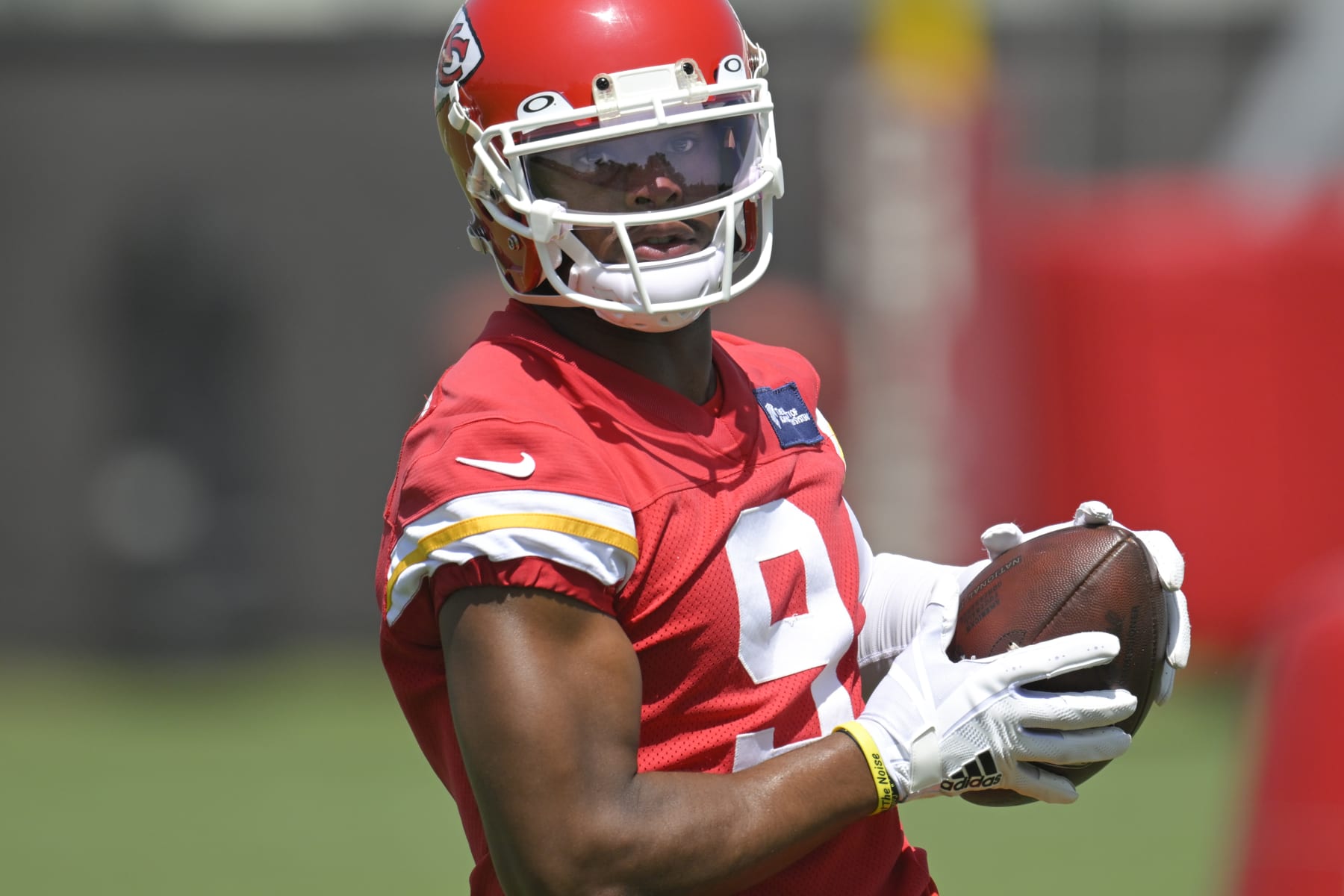 Kansas City Chiefs wide receiver JuJu Smith-Schuster makes a catch during the NFL football team's mandatory minicamp Tuesday, June 14, 2022, in Kansas City, Mo. (AP Photo/Reed Hoffmann)