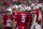 MADISON, WI - NOVEMBER 20: Wisconsin Badgers quarterback Graham Mertz (5), Wisconsin Badgers wide receiver Chimere Dike (13), Wisconsin Badgers tight end Jake Ferguson (84) and the rest of the offense turn and look at the big screen before getting into the huddle durning a college football game between the Nebraska Cornhuskers and the Wisconsin Badgers on November 20th, 2021 at Camp Randall Stadium in Madison, WI. (Photo by Dan Sanger/Icon Sportswire via Getty Images)