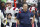 Houston, MA - October  10: Patriots quarterback Mac Jones (10) is pictured walking past head coach Bill Belichick after throwing an interception very early in the third quarter. The New England Patriots visited the Houston Texans for a regular season NFL football game at NRG Stadium in Houston, TX on Oct. 10, 2021. (Photo by Jim Davis/The Boston Globe via Getty Images)