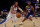 NEW YORK, NEW YORK - JANUARY 12:  Jalen Brunson #13 of the Dallas Mavericks drives around Alec Burks #18 of the New York Knicks in the first half at Madison Square Garden on January 12, 2022 in New York City. NOTE TO USER: User expressly acknowledges and agrees that, by downloading and or using this photograph, User is consenting to the terms and conditions of the Getty Images License Agreement. (Photo by Elsa/Getty Images)