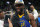 BOSTON, MA - JUNE 16: Draymond Green #23 of the Golden State Warriors smiles and celebrates on stage after winning Game Six of the 2022 NBA Finals against the Boston Celtics on June 16, 2022 at TD Garden in Boston, Massachusetts. NOTE TO USER: User expressly acknowledges and agrees that, by downloading and or using this photograph, user is consenting to the terms and conditions of Getty Images License Agreement. Mandatory Copyright Notice: Copyright 2022 NBAE (Photo by Garrett Ellwood/NBAE via Getty Images)