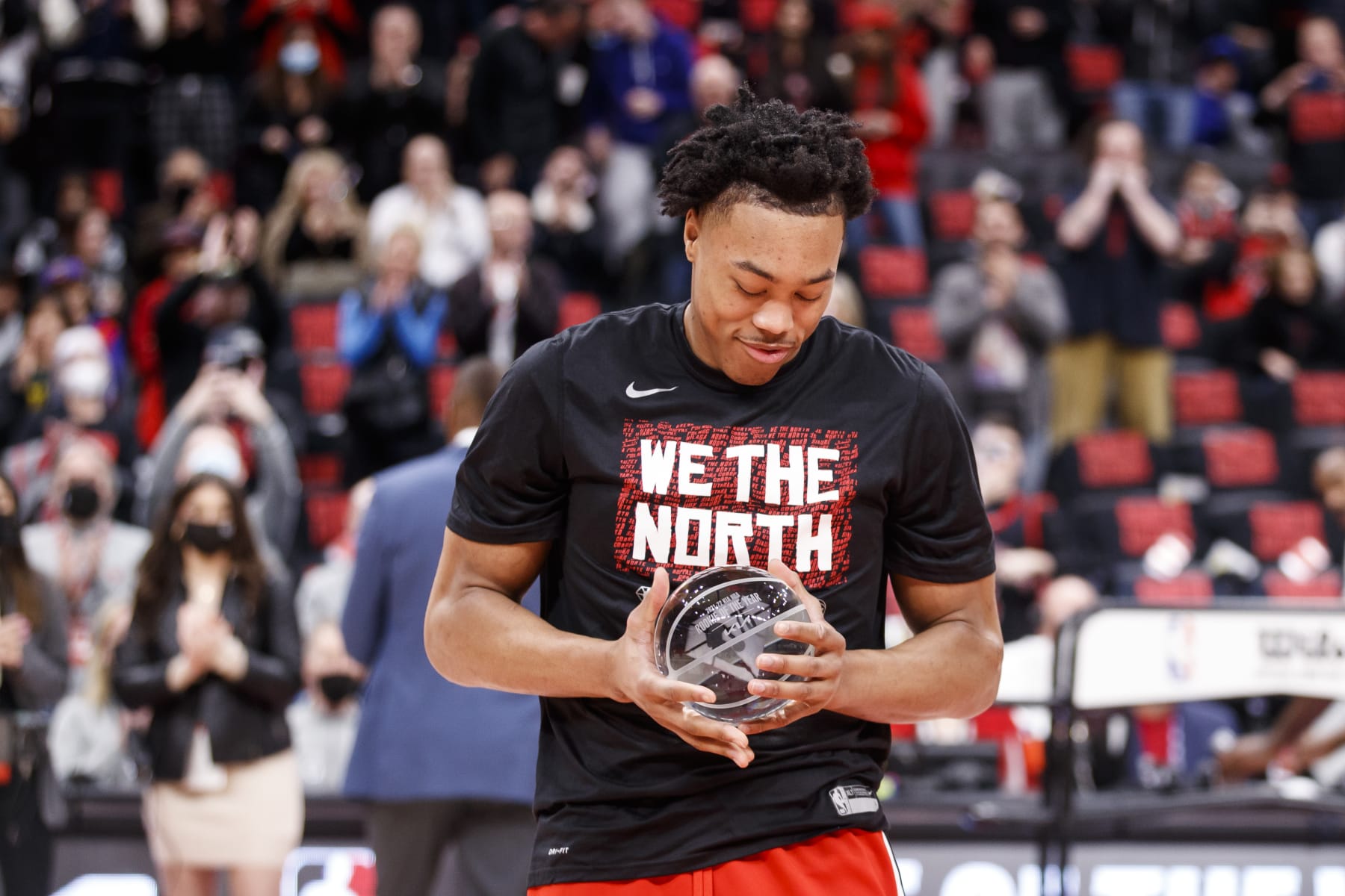 TORONTO, ON - APRIL 23: Scottie Barnes #4 of the Toronto Raptors is presented with the Rookie of the Year trophy ahead of Game Four of the Eastern Conference First Round against the Philadelphia 76ers at Scotiabank Arena on April 23, 2022 in Toronto, Canada. NOTE TO USER: User expressly acknowledges and agrees that, by downloading and or using this Photograph, user is consenting to the terms and conditions of the Getty Images License Agreement. (Photo by Cole Burston/Getty Images)