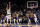 DALLAS, TEXAS - MAY 24: Luka Doncic #77 of the Dallas Mavericks shoots a three point basket against Jordan Poole #3 of the Golden State Warriors during the fourth quarter in Game Four of the 2022 NBA Playoffs Western Conference Finals at American Airlines Center on May 24, 2022 in Dallas, Texas. NOTE TO USER: User expressly acknowledges and agrees that, by downloading and or using this photograph, User is consenting to the terms and conditions of the Getty Images License Agreement. (Photo by Tom Pennington/Getty Images)