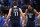 DALLAS, TX - MARCH 21: Luka Doncic #77 and Spencer Dinwiddie #26 of the Dallas Mavericks react as the Mavericks play the Minnesota Timberwolves late in the second half at American Airlines Center on March 21, 2022 in Dallas, Texas. The Mavericks won 110-108. NOTE TO USER: User expressly acknowledges and agrees that, by downloading and or using this photograph, User is consenting to the terms and conditions of the Getty Images License Agreement. (Photo by Ron Jenkins/Getty Images)