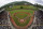 Hamilton, Ohio, lines the third base line and Taylor, Mich., line up on the first base line during player introductions before the Little League World Series Championship baseball game at Lamade Stadium in South Williamsport, Pa., Sunday, Aug. 29, 2021. (AP Photo/Gene J. Puskar)