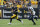 Pittsburgh Steelers quarterback Kenny Pickett (8) is pressured by Seattle Seahawks linebacker Boye Mafe (53) during a preseason NFL football game, Saturday, Aug. 13, 2022, in Pittsburgh, PA. (AP Photo/Matt Durisko)