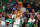BOSTON, MASSACHUSETTS - JUNE 16: Grant Williams #12 of the Boston Celtics shoots a three pointer against the Golden State Warriors during the second quarter in Game Six of the 2022 NBA Finals at TD Garden on June 16, 2022 in Boston, Massachusetts. NOTE TO USER: User expressly acknowledges and agrees that, by downloading and/or using this photograph, User is consenting to the terms and conditions of the Getty Images License Agreement. (Photo by Elsa/Getty Images)