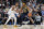 INDIANAPOLIS, INDIANA - MARCH 30: Terry Taylor #32 of the Indiana Pacers dribbles the ball while being guarded by Monte Morris #11 of the Denver Nuggets in the third quarter at Gainbridge Fieldhouse on March 30, 2022 in Indianapolis, Indiana. NOTE TO USER: User expressly acknowledges and agrees that, by downloading and or using this Photograph, user is consenting to the terms and conditions of the Getty Images License Agreement. (Photo by Dylan Buell/Getty Images)