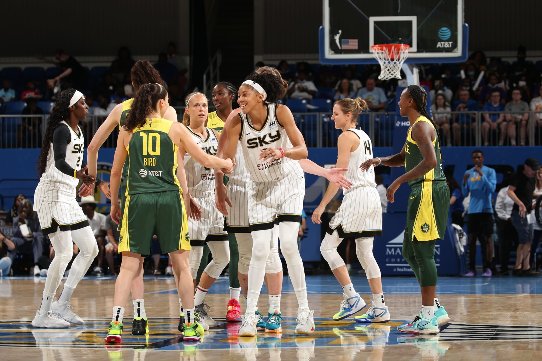 CHICAGO, IL - JULY 20: Sue Bird #10 of the Seattle Storm shakes hands with Candace Parker #3 of the Chicago Sky prior to the game on July 20, 2022 at the Wintrust Arena in Chicago, Illinois. NOTE TO USER: User expressly acknowledges and agrees that, by downloading and or using this photograph, user is consenting to the terms and conditions of the Getty Images License Agreement.  Mandatory Copyright Notice: Copyright 2022 NBAE (Photo by Gary Dineen/NBAE via Getty Images)