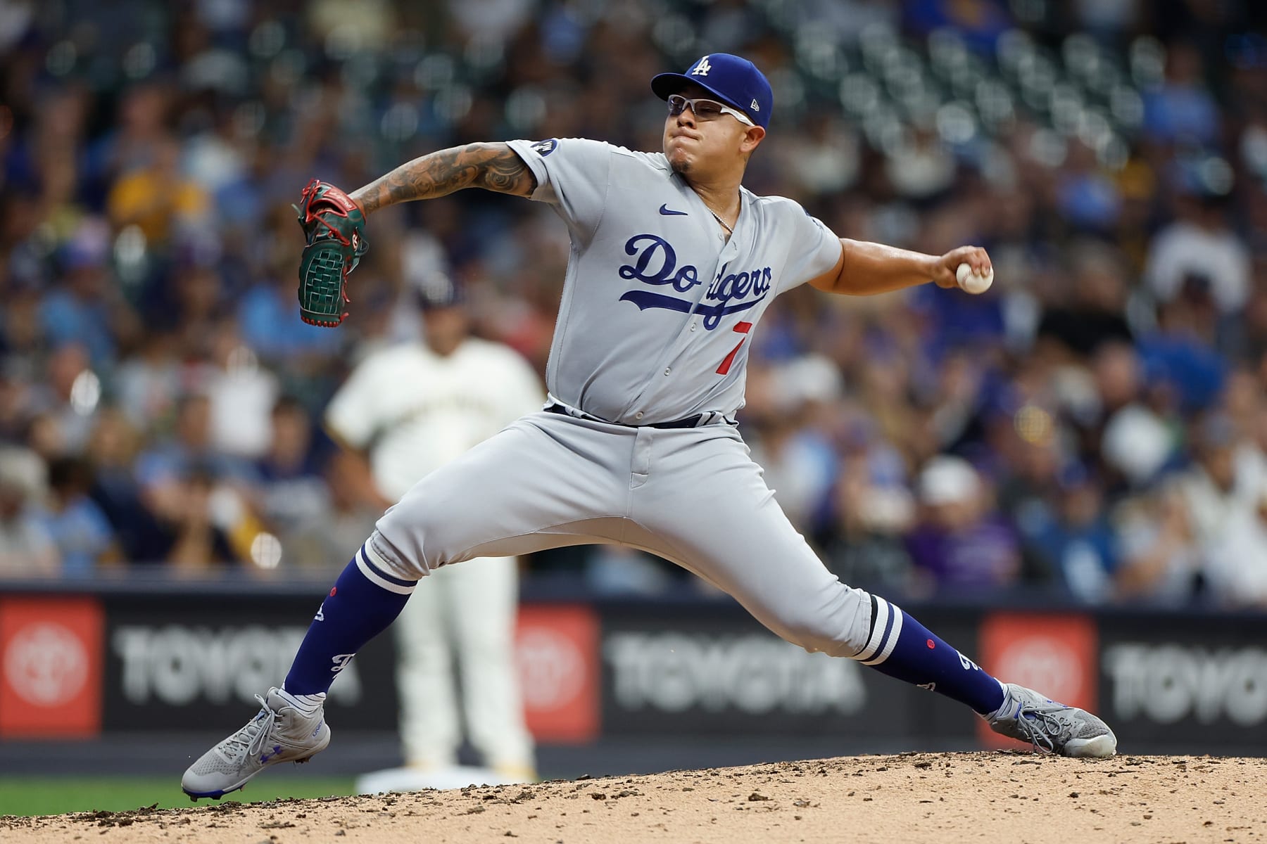 MILWAUKEE, WISCONSIN - AUGUST 15: Julio Urias #7 of the Los Angeles Dodgers throws a pitch in the second inning against the Milwaukee Brewers at American Family Field on August 15, 2022 in Milwaukee, Wisconsin. (Photo by John Fisher/Getty Images)