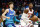 CHARLOTTE, NORTH CAROLINA - NOVEMBER 12: RJ Barrett #9 of the New York Knicks drives to the basket against LaMelo Ball #2 of the Charlotte Hornets during the first half of their game at Spectrum Center on November 12, 2021 in Charlotte, North Carolina. NOTE TO USER: User expressly acknowledges and agrees that, by downloading and or using this photograph, User is consenting to the terms and conditions of the Getty Images License Agreement. (Photo by Jared C. Tilton/Getty Images)