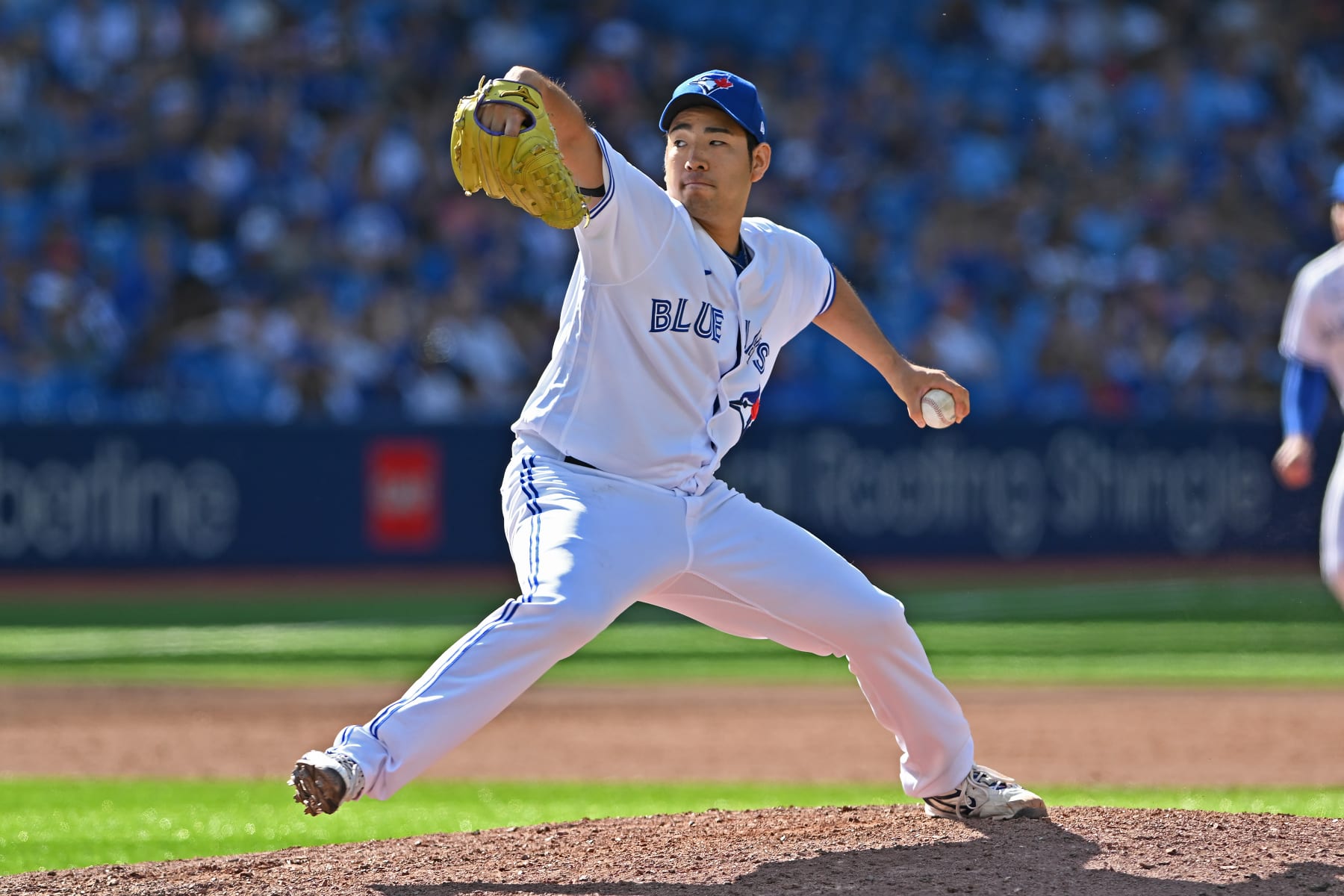 TORONTO, ON - AUGUST 28: Toronto Blue Jays Pitcher Yusei Kikuchi (16) pitches during the regular season MLB game between the Los Angeles Angels and Toronto Blue Jays on August 28, 2022 at Rogers Centre in Toronto, ON. (Photo by Gerry Angus/Icon Sportswire via Getty Images)
