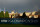 VIRGINIA WATER, ENGLAND - SEPTEMBER 08: A rainbow is seen as flags are flown at half-mast at the 1st tee following the announcement of the death of Her Majesty Queen Elizabeth II during Day One of the BMW PGA Championship at Wentworth Golf Club on September 08, 2022 in Virginia Water, England. (Photo by Andrew Redington/Getty Images)