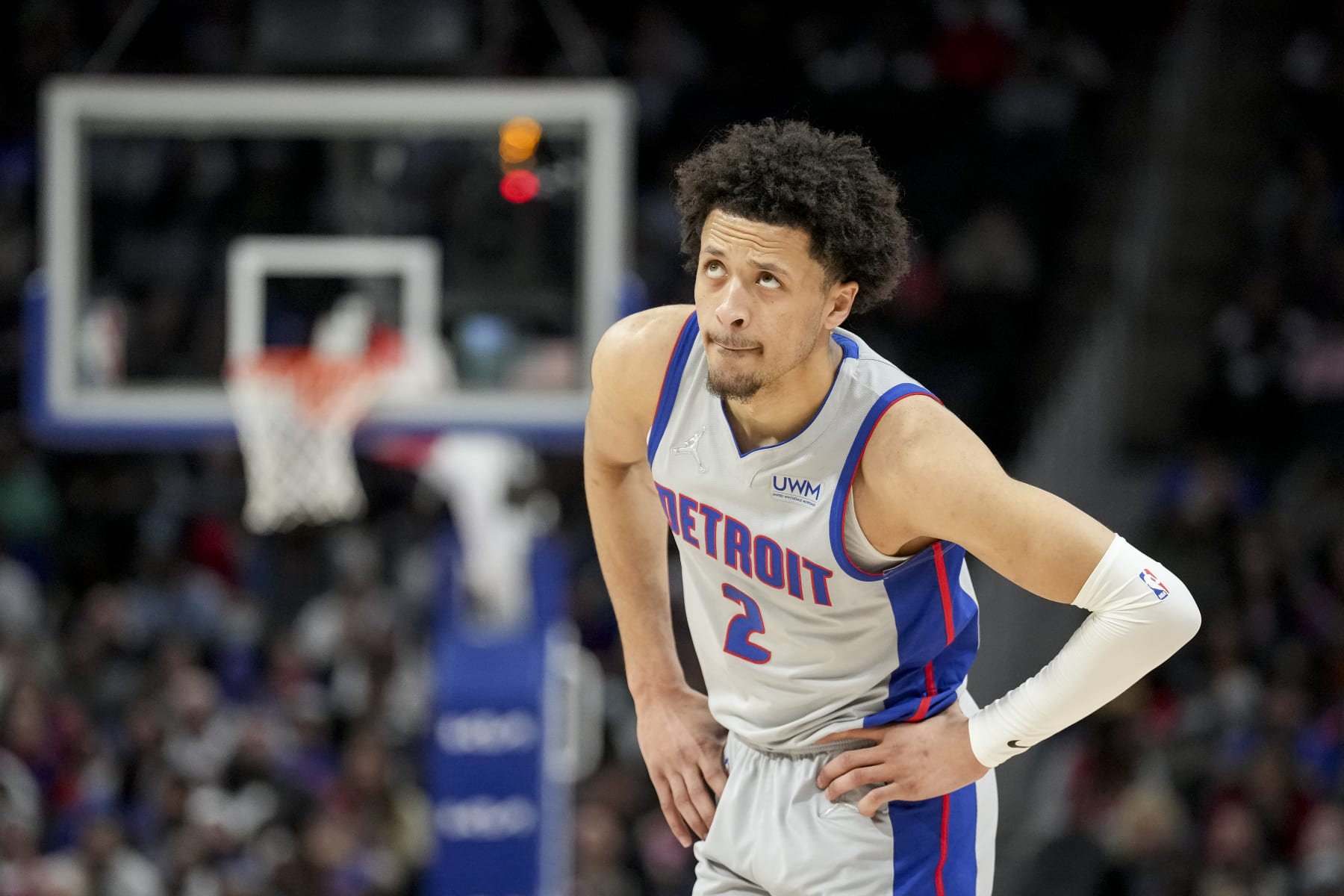 DETROIT, MICHIGAN - MARCH 31: Cade Cunningham #2 of the Detroit Pistons looks on against the Philadelphia 76ers during the first quarter at Little Caesars Arena on March 31, 2022 in Detroit, Michigan. NOTE TO USER: User expressly acknowledges and agrees that, by downloading and or using this photograph, User is consenting to the terms and conditions of the Getty Images License Agreement. (Photo by Nic Antaya/Getty Images)