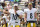 Pittsburgh Steelers quarterback Mitch Trubisky (10) passes as Kenny Pickett (8) watches during practice at NFL football training camp in the Latrobe Memorial Stadium in Latrobe, Pa., Monday, Aug. 8, 2022. (AP Photo/Keith Srakocic)