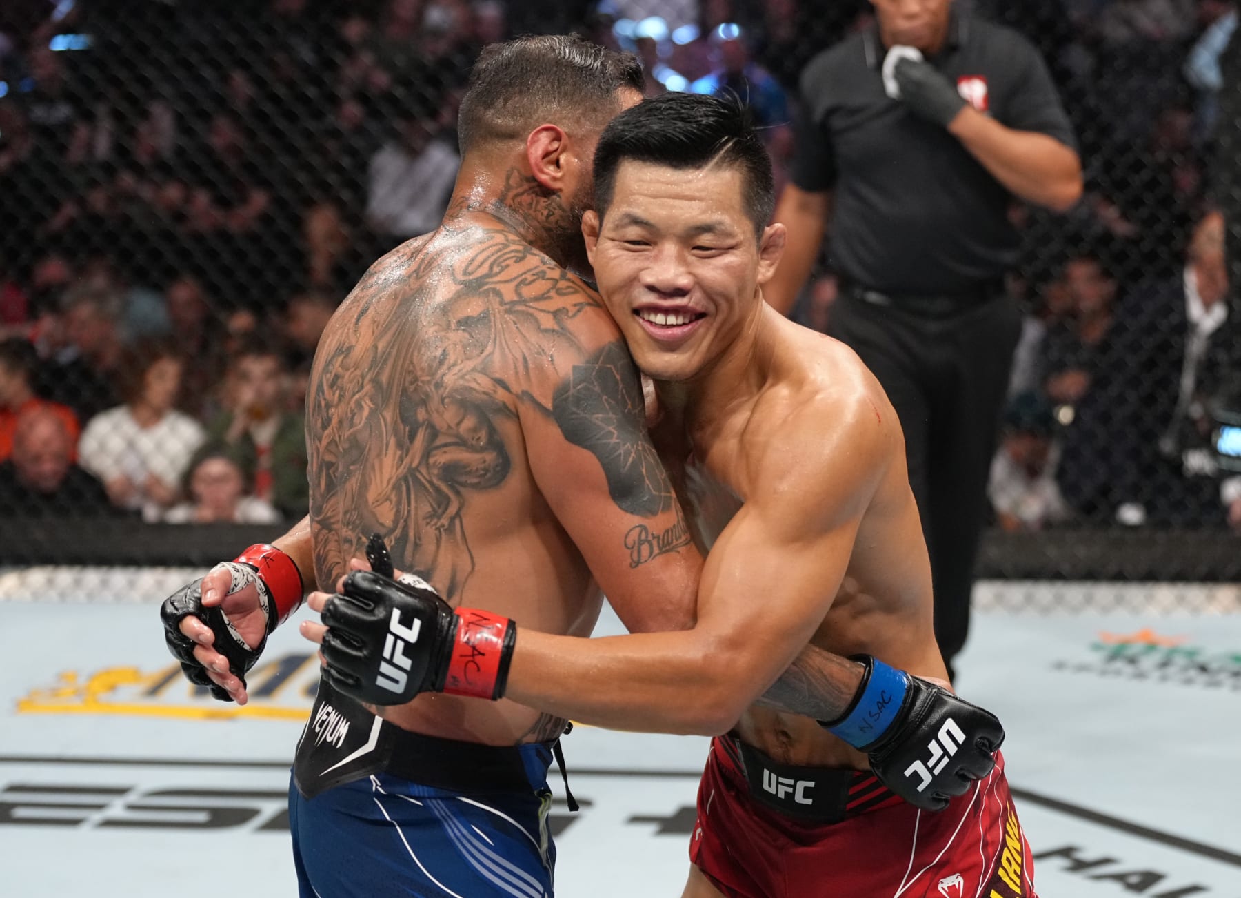 LAS VEGAS, NEVADA - SEPTEMBER 10: (L-R) Daniel Rodriguez and Li Jingliang of China talk after the conclusion of their 180-pound catchweight fight during the UFC 279 event at T-Mobile Arena on September 10, 2022 in Las Vegas, Nevada. (Photo by Jeff Bottari/Zuffa LLC)
