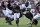 Appalachian State defensive lineman KaRon White (93) brings down Texas A&M running back Devon Achane (6) after a short gain during the second half of an NCAA college football game Saturday, Sept. 10, 2022, in College Station, Texas. (AP Photo/Sam Craft)