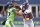 SEATTLE, WASHINGTON - SEPTEMBER 12: Javonte Williams #33 of the Denver Broncos stiff-arms Cody Barton #57 of the Seattle Seahawks during the third quarter at Lumen Field on September 12, 2022 in Seattle, Washington. (Photo by Steph Chambers/Getty Images)