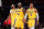 LOS ANGELES, CA - OCTOBER 12: Anthony Davis #3, LeBron James #6 and Russell Westbrook #0 of the Los Angeles Lakers look on during a preseason game against the Golden State Warriors on October 12, 2021 at STAPLES Center in Los Angeles, California. NOTE TO USER: User expressly acknowledges and agrees that, by downloading and/or using this Photograph, user is consenting to the terms and conditions of the Getty Images License Agreement. Mandatory Copyright Notice: Copyright 2021 NBAE (Photo by Adam Pantozzi/NBAE via Getty Images)
