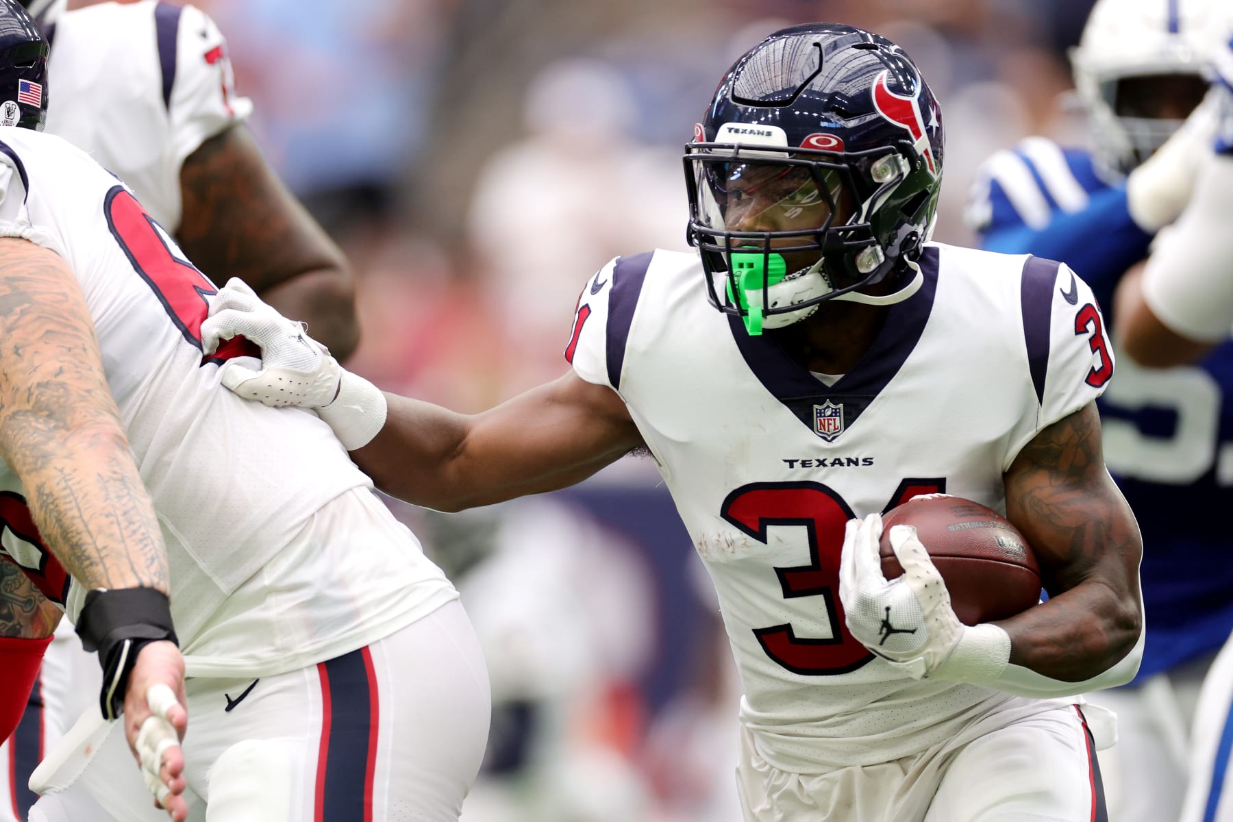 HOUSTON, TEXAS - SEPTEMBER 11: Dameon Pierce #31 of the Houston Texans carries the ball during the first half against the Indianapolis Colts at NRG Stadium on September 11, 2022 in Houston, Texas. (Photo by Carmen Mandato/Getty Images)