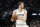 DALLAS, TEXAS - APRIL 10: Jakob Poeltl #25 of the San Antonio Spurs looks to pass in the game against the Dallas Mavericks at American Airlines Center on April 10, 2022 in Dallas, Texas. NOTE TO USER: User expressly acknowledges and agrees that, by downloading and or using this photograph, User is consenting to the terms and conditions of the Getty Images License Agreement.  (Photo by Tim Heitman/Getty Images)