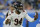 FILE - Chicago Bears' Robert Quinn (94) rushes a play during the second half of an NFL football game against the Detroit Lions in Detroit, on Nov. 25, 2021. Quinn joined the rest of the team on the practice field, Wednesday, July 27, 2022, for the first time under new coach Matt Eberflus after missing all offseason voluntary and mandatory work. (AP Photo/Duane Burleson, File)