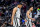 DETROIT, MICHIGAN - JANUARY 01: Keldon Johnson #3 and Tre Jones #33 of the San Antonio Spurs walk back to the bench during the fourth quarter against the Detroit Pistons at Little Caesars Arena on January 01, 2022 in Detroit, Michigan. NOTE TO USER: User expressly acknowledges and agrees that, by downloading and or using this photograph, User is consenting to the terms and conditions of the Getty Images License Agreement. (Photo by Nic Antaya/Getty Images)