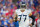 ORCHARD PARK, NY - SEPTEMBER 19: Taylor Lewan #77 of the Tennessee Titans runs onto the field against the Buffalo Bills at Highmark Stadium on September 19, 2022 in Orchard Park, New York. (Photo by Cooper Neill/Getty Images)