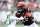 EAST RUTHERFORD, NEW JERSEY - SEPTEMBER 25: Joe Mixon #28 of the Cincinnati Bengals runs with the ball against Michael Carter II #30 of the New York Jets during the first quarter at MetLife Stadium on September 25, 2022 in East Rutherford, New Jersey. (Photo by Jamie Squire/Getty Images)