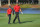 ORLANDO, FL - DECEMBER 19: Tiger Woods walks with his son, Charlie Woods, along the 18th fairway during the final round of the PGA TOUR Champions PNC Championship at Ritz-Carlton Golf Club on December 19, 2021 in Orlando, Florida. (Photo by Ben Jared/PGA TOUR)