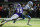 Detroit Lions wide receiver Amon-Ra St. Brown (14) runs from Minnesota Vikings cornerback Chandon Sullivan (39) after catching a pass during the second half of an NFL football game, Sunday, Sept. 25, 2022, in Minneapolis. (AP Photo/Craig Lassig)