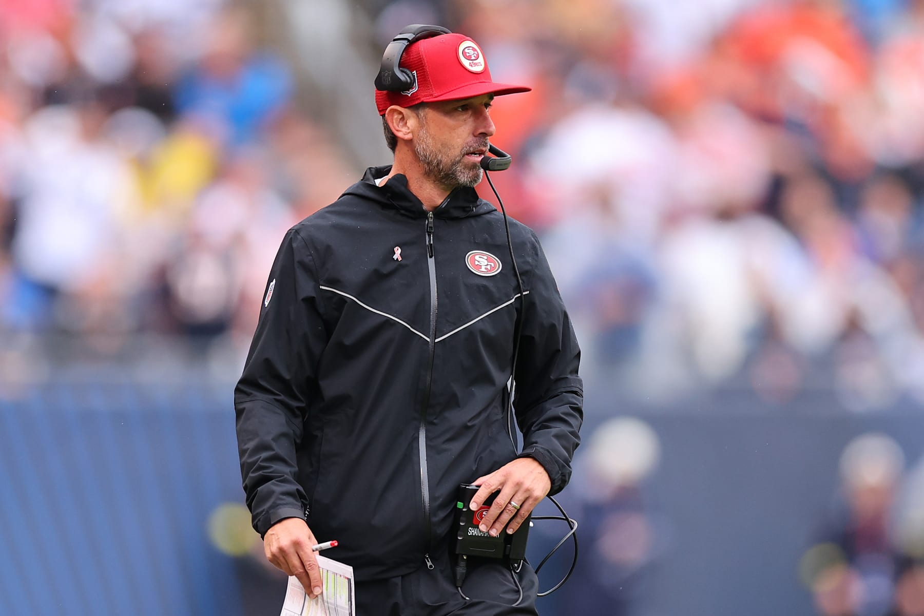 CHICAGO, ILLINOIS - SEPTEMBER 11: Head coach Kyle Shanahan of the San Francisco 49ers looks on against the Chicago Bears at Soldier Field on September 11, 2022 in Chicago, Illinois. (Photo by Michael Reaves/Getty Images)
