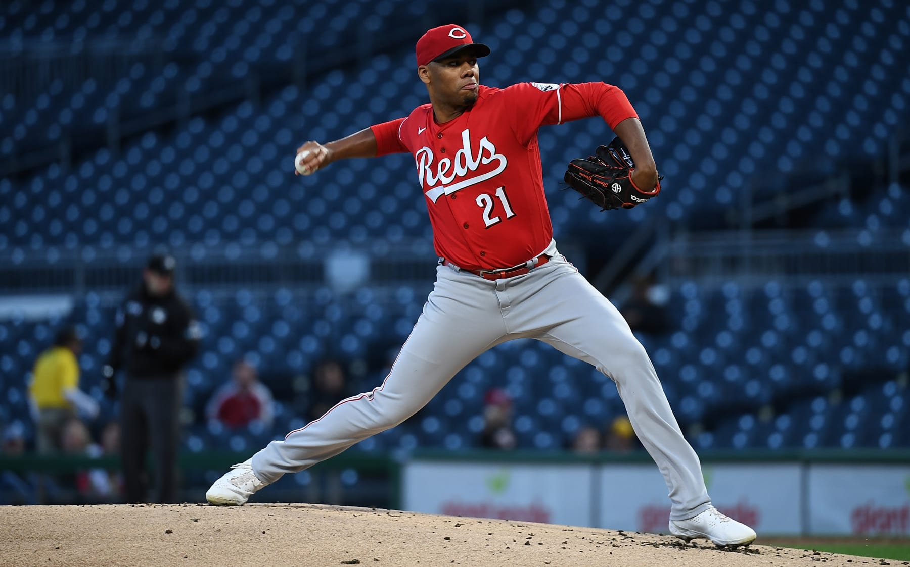 PITTSBURGH, PA - SEPTEMBER 27: Hunter Greene #21 of the Cincinnati Reds delivers a pitch in the first inning during the game against the Pittsburgh Pirates at PNC Park on September 27, 2022 in Pittsburgh, Pennsylvania. (Photo by Justin Berl/Getty Images)