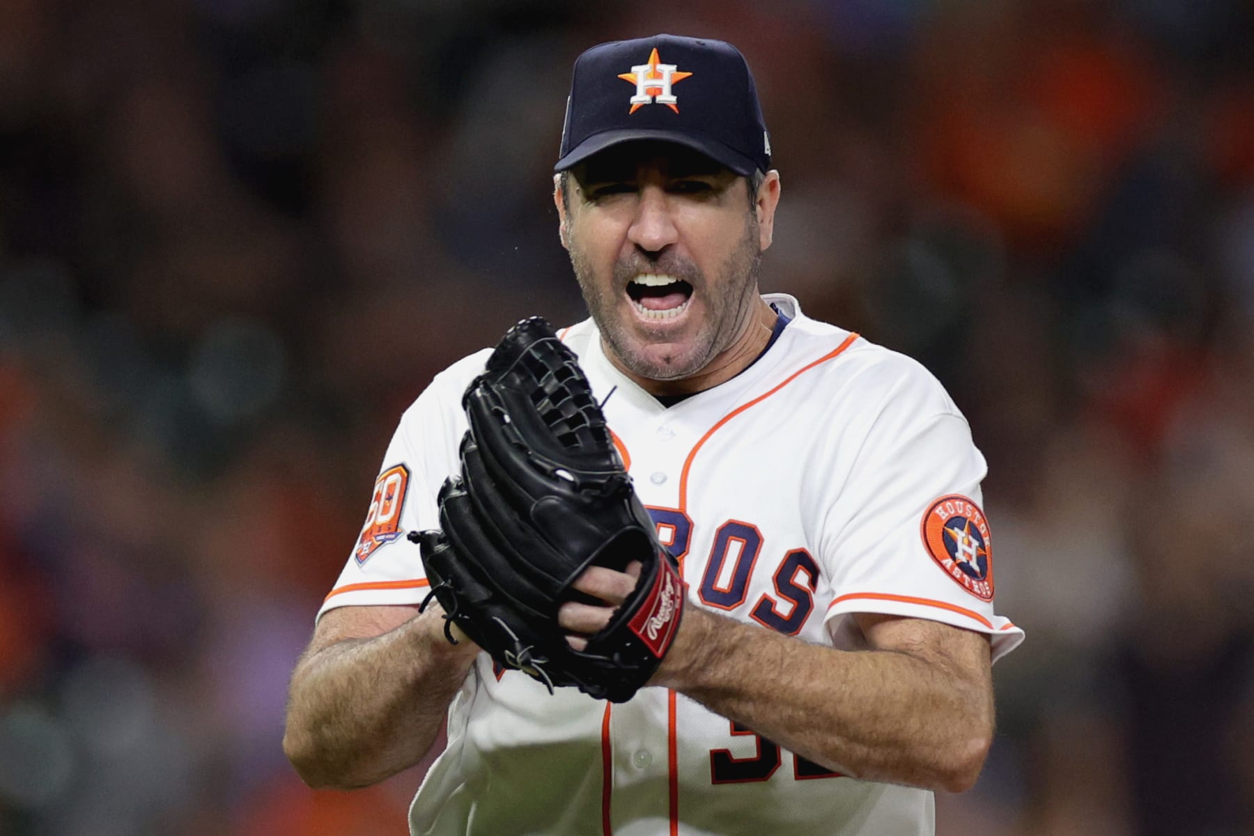 HOUSTON, TEXAS - SEPTEMBER 28: Justin Verlander #35 of the Houston Astros reacts to striking out Pavin Smith #26 of the Arizona Diamondbacks to get out of the seventh inning with two men on base at Minute Maid Park on September 28, 2022 in Houston, Texas. (Photo by Carmen Mandato/Getty Images)